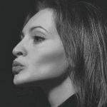 Angelina Jolie Pairs Quiet Luxury-Coded Look With a $3,000 Purse